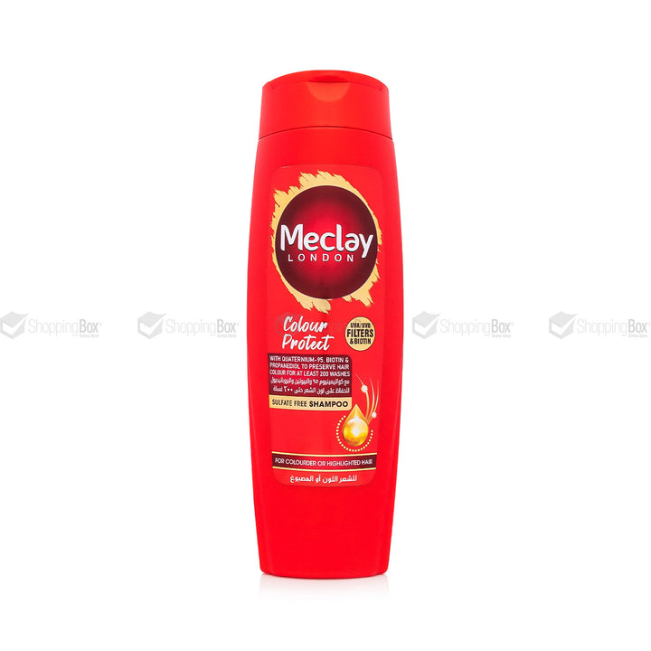 Red shampoo bottle with Meclay London branding on a white background
