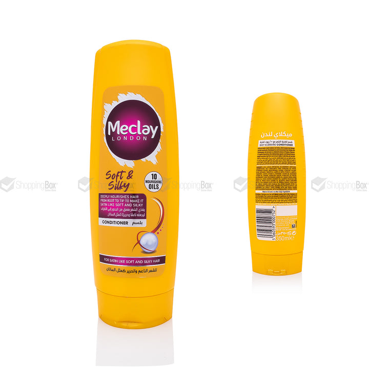 Yellow conditioner bottle with Meclay London branding on a white background