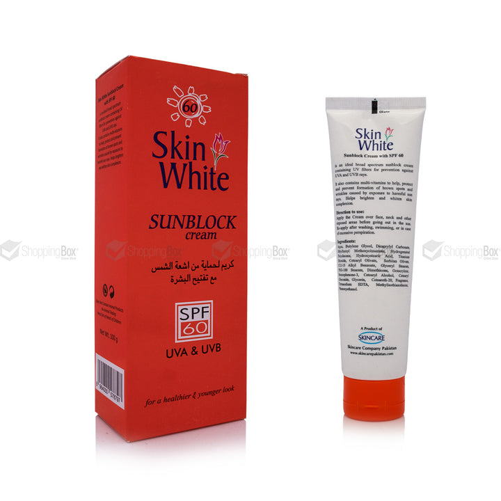 Red box and white tube of Skin White Sunblock cream on a white background