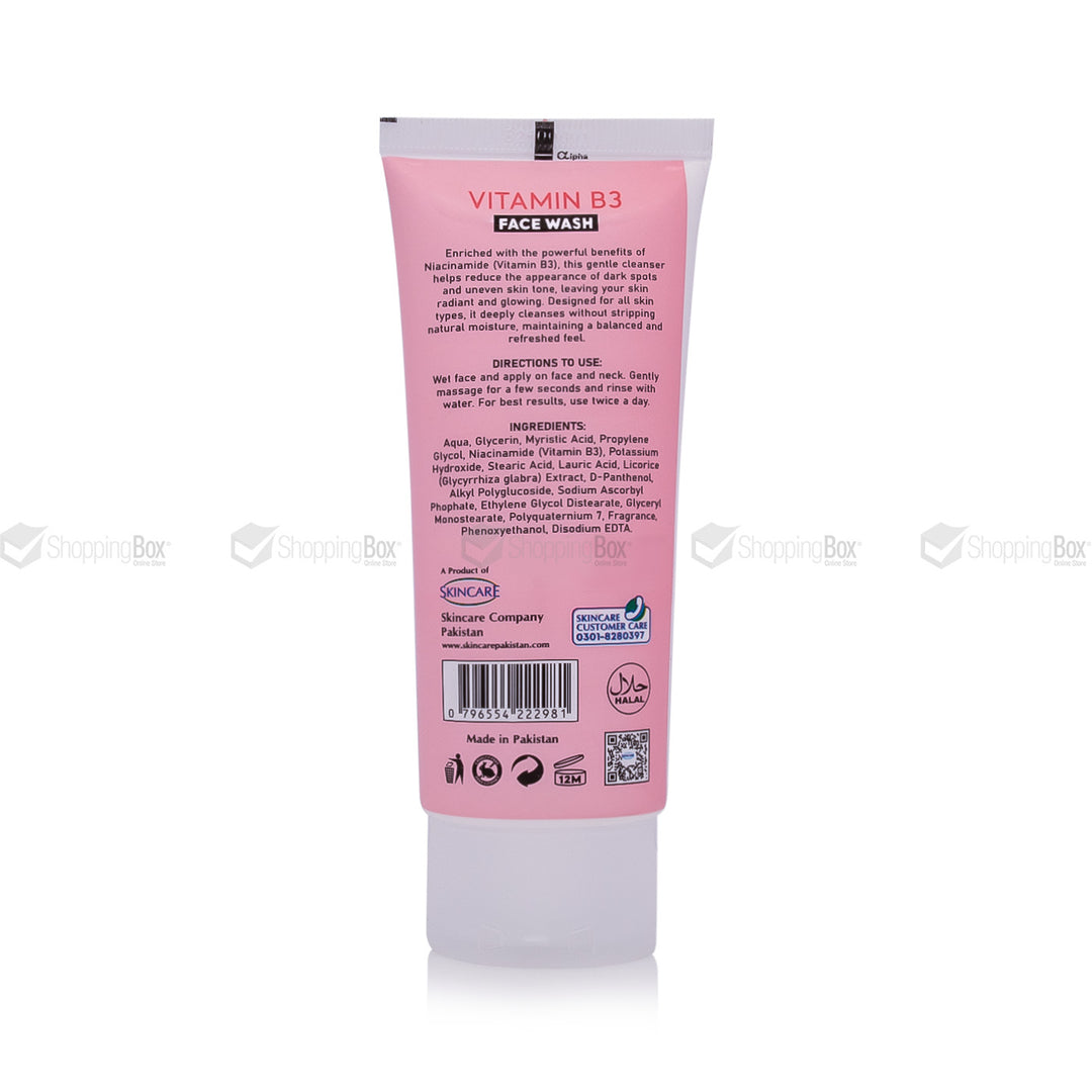 Pink tube of Vitamin B3 face wash with text and branding on a white background