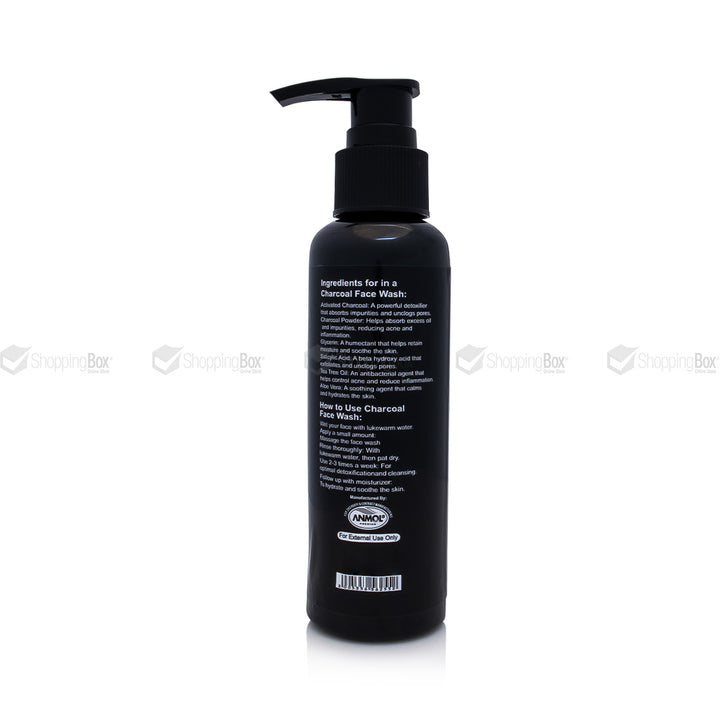 Black bottle with pump dispenser on a white background