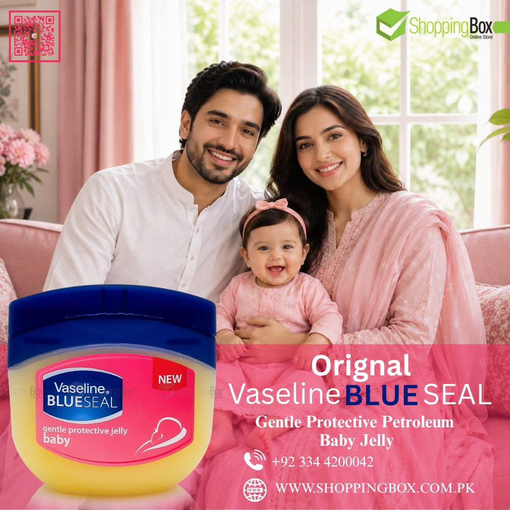A family of three is shown smiling in a pink living room while a jar of Vaseline Blue Seal baby jelly is prominently displayed in the foreground. The image includes the Vaseline brand logo and a ShoppingBox promotional overlay with contact details and website text.