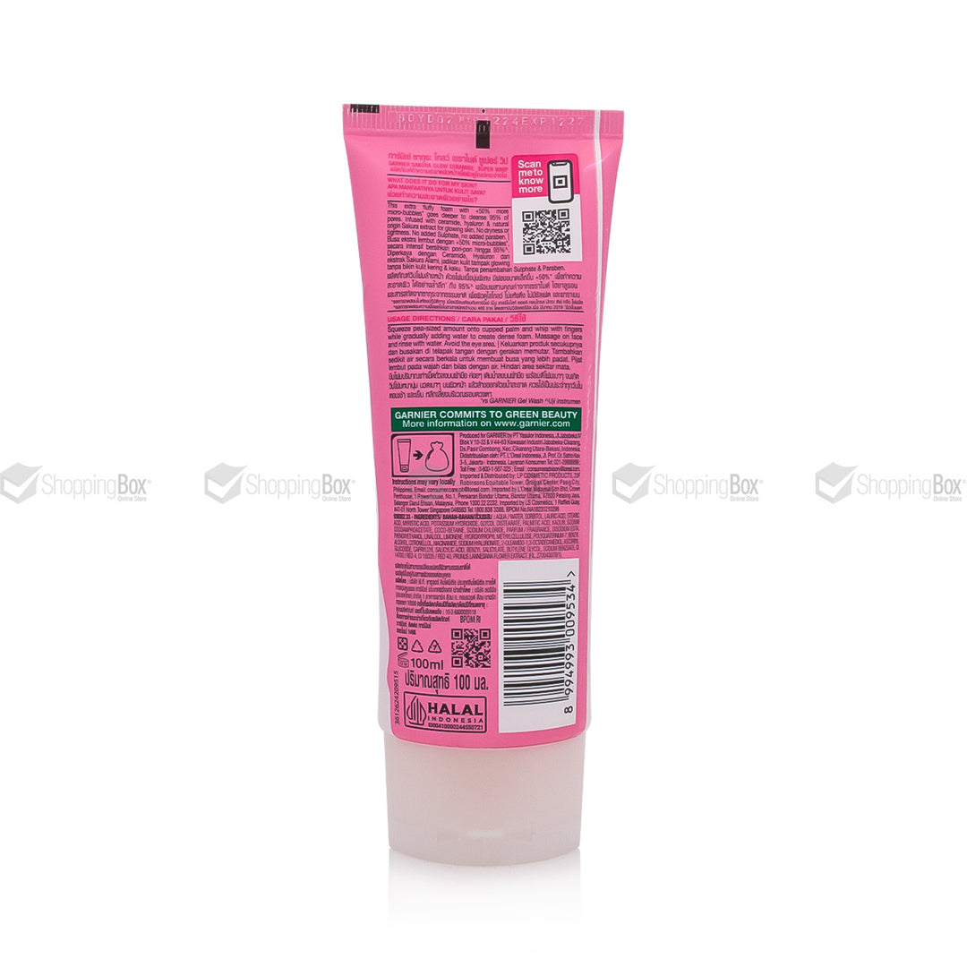 Pink tube with text and logos on a white background