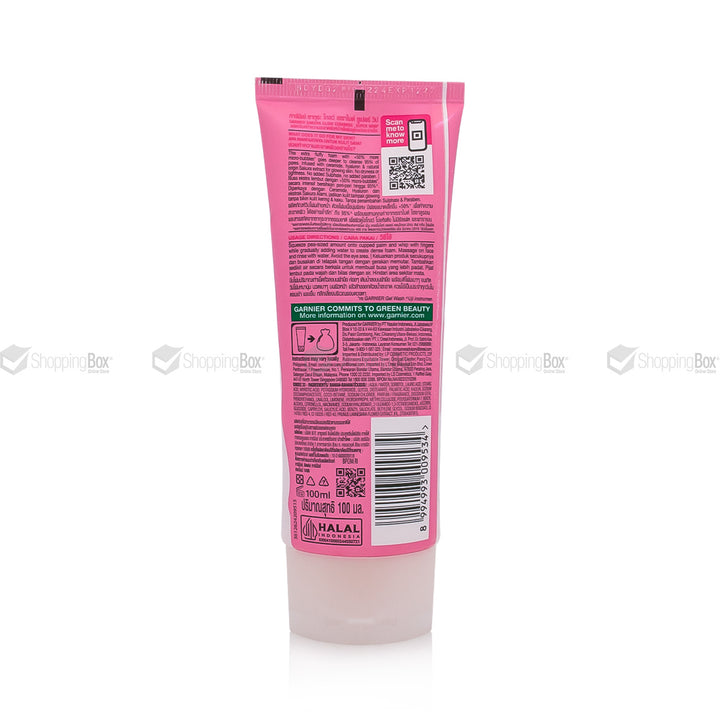 Pink tube with text and logos on a white background